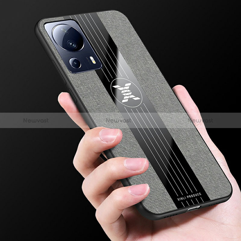 Ultra-thin Silicone Gel Soft Case Cover with Magnetic Finger Ring Stand X03L for Xiaomi Mi 13 Lite 5G