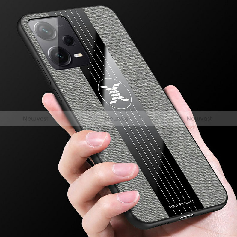 Ultra-thin Silicone Gel Soft Case Cover with Magnetic Finger Ring Stand X03L for Xiaomi Redmi Note 12 Pro 5G